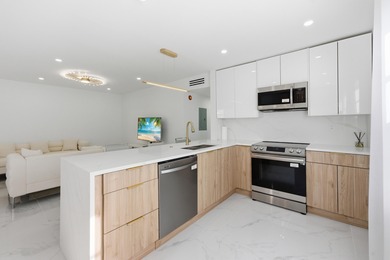 Welcome to 618 Normandy M - a beautifully renovated 2nd-floor on Kings Point Golf -Flanders Way in Florida - for sale on GolfHomes.com, golf home, golf lot