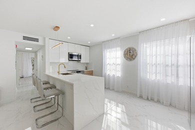 Welcome to 618 Normandy M - a beautifully renovated 2nd-floor on Kings Point Golf -Flanders Way in Florida - for sale on GolfHomes.com, golf home, golf lot