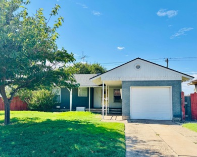 Nestled on a large lot in a well-kept neighborhood, this on Phillips Country Club in Texas - for sale on GolfHomes.com, golf home, golf lot