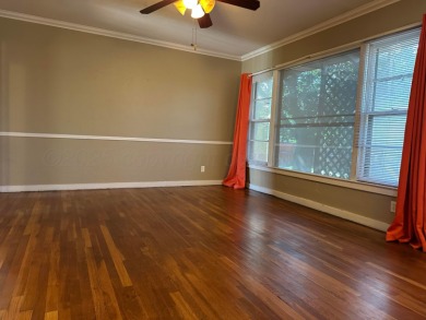Nestled on a large lot in a well-kept neighborhood, this on Phillips Country Club in Texas - for sale on GolfHomes.com, golf home, golf lot