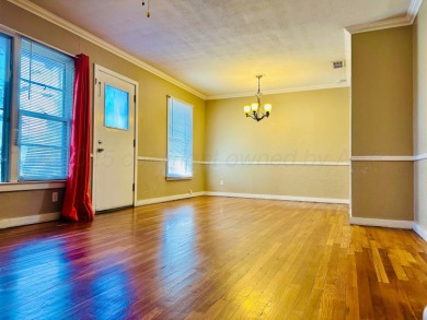 Nestled on a large lot in a well-kept neighborhood, this on Phillips Country Club in Texas - for sale on GolfHomes.com, golf home, golf lot
