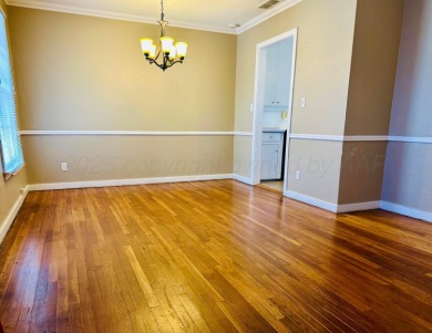 Nestled on a large lot in a well-kept neighborhood, this on Phillips Country Club in Texas - for sale on GolfHomes.com, golf home, golf lot