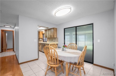 Discover this beautifully maintained 3-bedroom, 2-bathroom home on Sugarmill Woods Golf and Country Club in Florida - for sale on GolfHomes.com, golf home, golf lot