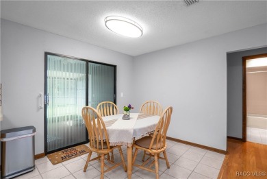 Discover this beautifully maintained 3-bedroom, 2-bathroom home on Sugarmill Woods Golf and Country Club in Florida - for sale on GolfHomes.com, golf home, golf lot