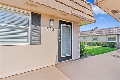 REMARKABLE FIRST-FLOOR CONDO | DESIRABLE 55+ KINGS POINT DELRAY on Kings Point Golf - Executive in Florida - for sale on GolfHomes.com, golf home, golf lot