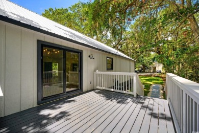 Nestled amidst the tranquil coastal beauty of Pawleys Island, SC on True Blue Plantation in South Carolina - for sale on GolfHomes.com, golf home, golf lot