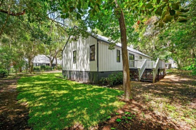 Nestled amidst the tranquil coastal beauty of Pawleys Island, SC on True Blue Plantation in South Carolina - for sale on GolfHomes.com, golf home, golf lot