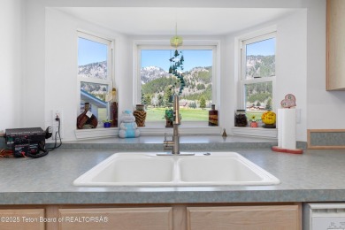 Beautifully landscaped and ideally situated on the 11th fairway on Star Valley RV Golf Course in Wyoming - for sale on GolfHomes.com, golf home, golf lot