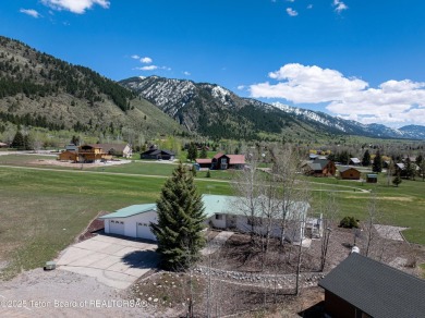 Beautifully landscaped and ideally situated on the 11th fairway on Star Valley RV Golf Course in Wyoming - for sale on GolfHomes.com, golf home, golf lot