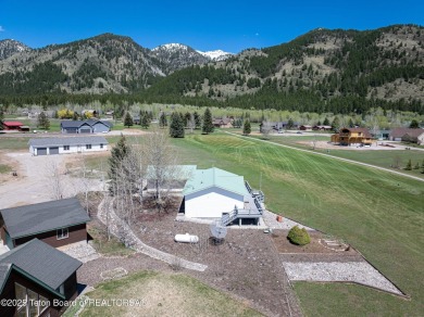 Beautifully landscaped and ideally situated on the 11th fairway on Star Valley RV Golf Course in Wyoming - for sale on GolfHomes.com, golf home, golf lot