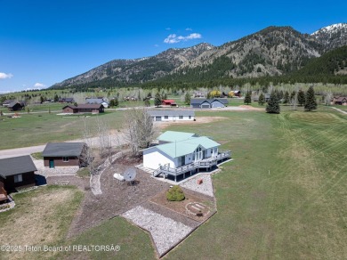 Beautifully landscaped and ideally situated on the 11th fairway on Star Valley RV Golf Course in Wyoming - for sale on GolfHomes.com, golf home, golf lot
