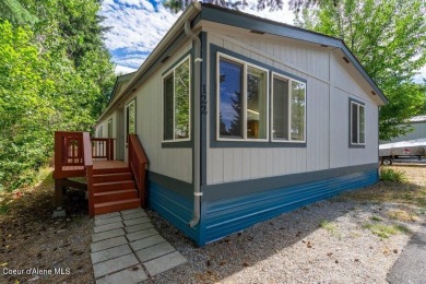 Welcome to this beautifully remodeled 3-bedroom, 2-bath home on Hayden Lake Country Club in Idaho - for sale on GolfHomes.com, golf home, golf lot