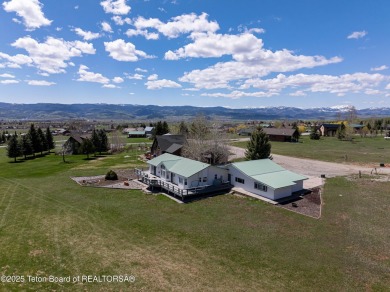 Beautifully landscaped and ideally situated on the 11th fairway on Star Valley RV Golf Course in Wyoming - for sale on GolfHomes.com, golf home, golf lot
