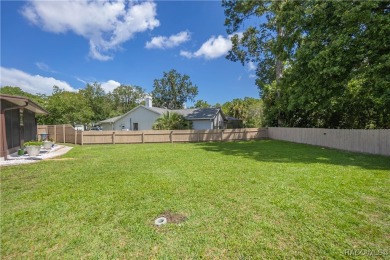 Discover this beautifully maintained 3-bedroom, 2-bathroom home on Sugarmill Woods Golf and Country Club in Florida - for sale on GolfHomes.com, golf home, golf lot