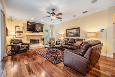 Set on an exceptional oversized wooded corner lot, nearly half on East Lake Woodlands Country Club in Florida - for sale on GolfHomes.com, golf home, golf lot
