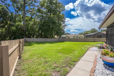 Discover this beautifully maintained 3-bedroom, 2-bathroom home on Sugarmill Woods Golf and Country Club in Florida - for sale on GolfHomes.com, golf home, golf lot