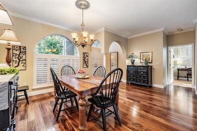 Set on an exceptional oversized wooded corner lot, nearly half on East Lake Woodlands Country Club in Florida - for sale on GolfHomes.com, golf home, golf lot