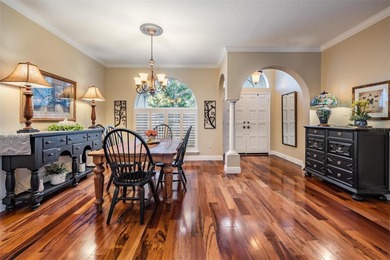 Set on an exceptional oversized wooded corner lot, nearly half on East Lake Woodlands Country Club in Florida - for sale on GolfHomes.com, golf home, golf lot