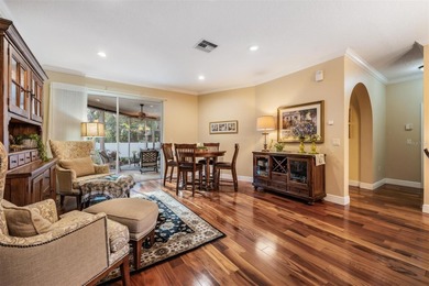 Set on an exceptional oversized wooded corner lot, nearly half on East Lake Woodlands Country Club in Florida - for sale on GolfHomes.com, golf home, golf lot