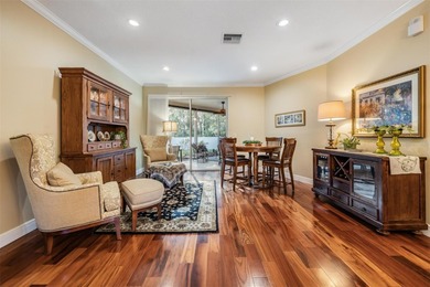 Set on an exceptional oversized wooded corner lot, nearly half on East Lake Woodlands Country Club in Florida - for sale on GolfHomes.com, golf home, golf lot