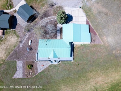 Beautifully landscaped and ideally situated on the 11th fairway on Star Valley RV Golf Course in Wyoming - for sale on GolfHomes.com, golf home, golf lot
