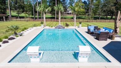 Introducing Fairway Oasis- a custom-crafted estate nestled in on The Members Club At Woodcreek in South Carolina - for sale on GolfHomes.com, golf home, golf lot