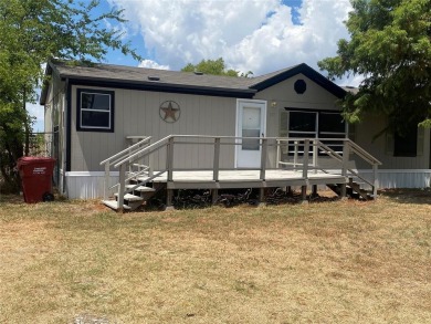 3-2-2cpt on 2 lots in The City of West Tawakoni! Across from the on Tawakoni Golf Course in Texas - for sale on GolfHomes.com, golf home, golf lot