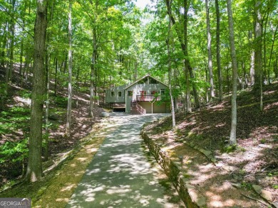 You will fall in love when you step inside and see the main on The Highlands Course at Lake Arrowhead in Georgia - for sale on GolfHomes.com, golf home, golf lot