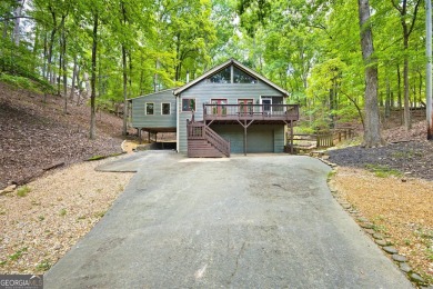 You will fall in love when you step inside and see the main on The Highlands Course at Lake Arrowhead in Georgia - for sale on GolfHomes.com, golf home, golf lot