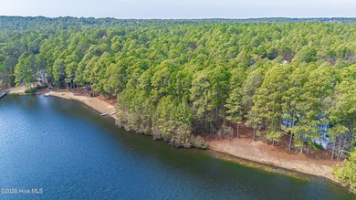 13 Abington Drive, a rare lakefront estate homesite in Pinewild on Pinewild Country Club of Pinehurst in North Carolina - for sale on GolfHomes.com, golf home, golf lot