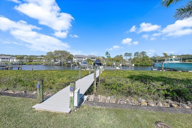 Experience the epitome of waterfront luxury in this first-floor on Jonathans Landing Golf Club in Florida - for sale on GolfHomes.com, golf home, golf lot