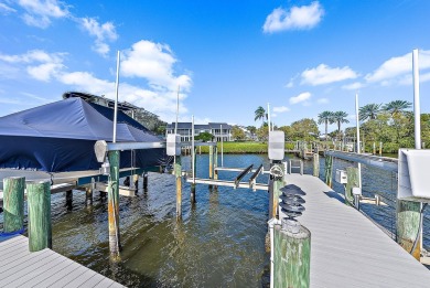 Experience the epitome of waterfront luxury in this first-floor on Jonathans Landing Golf Club in Florida - for sale on GolfHomes.com, golf home, golf lot