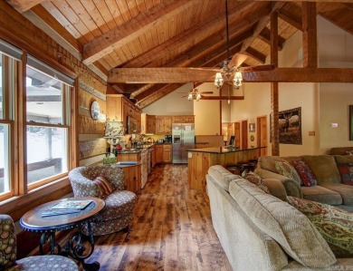 Discover your peaceful forest retreat in this inviting 3-bedroom on Cortez Golf Course in Arkansas - for sale on GolfHomes.com, golf home, golf lot