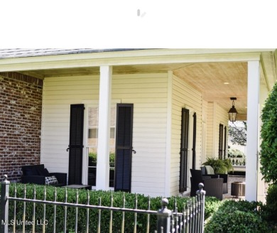 A southern dream on the 18th hole with breath taking waterfront on Lake Caroline Golf Club in Mississippi - for sale on GolfHomes.com, golf home, golf lot