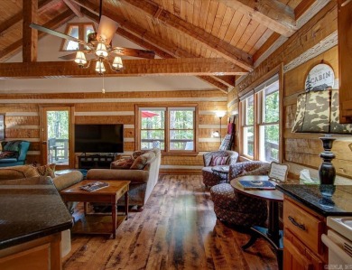Discover your peaceful forest retreat in this inviting 3-bedroom on Cortez Golf Course in Arkansas - for sale on GolfHomes.com, golf home, golf lot