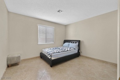 Spacious 4-bedroom, 3-bath home in desirable Valley West on Canyon Gate Country Club in Nevada - for sale on GolfHomes.com, golf home, golf lot