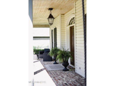 A southern dream on the 18th hole with breath taking waterfront on Lake Caroline Golf Club in Mississippi - for sale on GolfHomes.com, golf home, golf lot