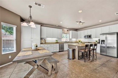 Spacious 6-Bed, 3-Bath Retreat with Golf Course Views in Rancho on Rancho Vista Golf Course in California - for sale on GolfHomes.com, golf home, golf lot