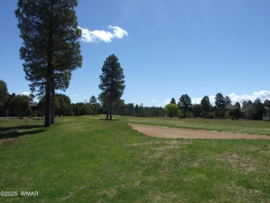 Gorgeous getaway in the beautiful White Mountains of Arizona on Bison Golf and Country Club in Arizona - for sale on GolfHomes.com, golf home, golf lot