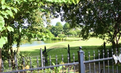 A southern dream on the 18th hole with breath taking waterfront on Lake Caroline Golf Club in Mississippi - for sale on GolfHomes.com, golf home, golf lot