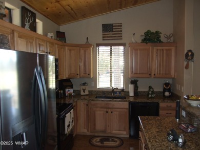 Gorgeous getaway in the beautiful White Mountains of Arizona on Bison Golf and Country Club in Arizona - for sale on GolfHomes.com, golf home, golf lot
