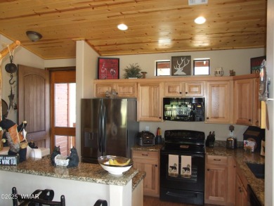 Gorgeous getaway in the beautiful White Mountains of Arizona on Bison Golf and Country Club in Arizona - for sale on GolfHomes.com, golf home, golf lot