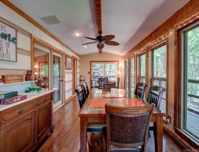 Discover your peaceful forest retreat in this inviting 3-bedroom on Cortez Golf Course in Arkansas - for sale on GolfHomes.com, golf home, golf lot