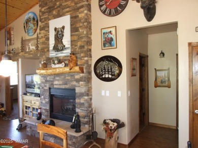 Gorgeous getaway in the beautiful White Mountains of Arizona on Bison Golf and Country Club in Arizona - for sale on GolfHomes.com, golf home, golf lot