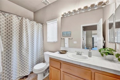 Spacious 6-Bed, 3-Bath Retreat with Golf Course Views in Rancho on Rancho Vista Golf Course in California - for sale on GolfHomes.com, golf home, golf lot
