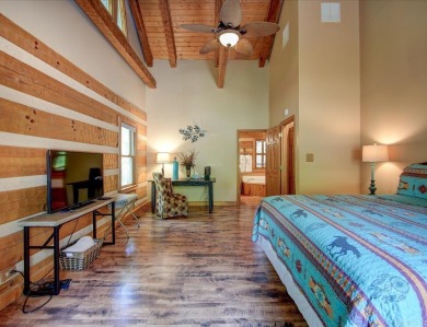 Discover your peaceful forest retreat in this inviting 3-bedroom on Cortez Golf Course in Arkansas - for sale on GolfHomes.com, golf home, golf lot