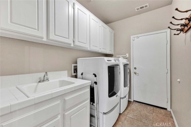 Spacious 6-Bed, 3-Bath Retreat with Golf Course Views in Rancho on Rancho Vista Golf Course in California - for sale on GolfHomes.com, golf home, golf lot