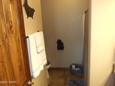 Gorgeous getaway in the beautiful White Mountains of Arizona on Bison Golf and Country Club in Arizona - for sale on GolfHomes.com, golf home, golf lot