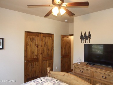 Gorgeous getaway in the beautiful White Mountains of Arizona on Bison Golf and Country Club in Arizona - for sale on GolfHomes.com, golf home, golf lot