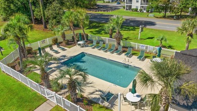Your coastal top-floor retreat awaits, just 4 miles from the on River Oaks Golf Plantation  in South Carolina - for sale on GolfHomes.com, golf home, golf lot